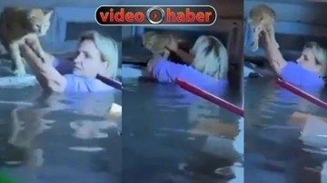 Antalya'da yaşanan sel felaketinde hayatını hiçe sayıp kediyi kurtardı