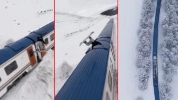 Nefes kesen anlar saniye saniye kamerada: Snowboardla Doğu Ekspresi’nin üzerinden böyle atladı!